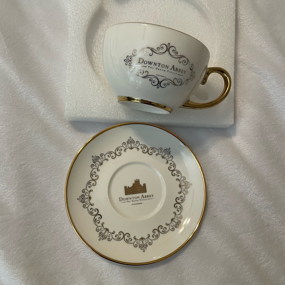Downton abbey Elegant Gold Rimmed White Teacup and saucer